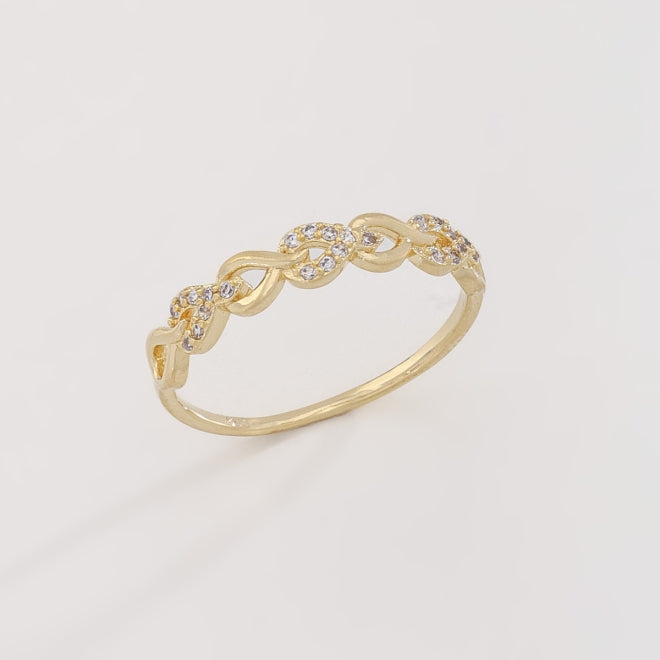 ANEL COM DETALHES ENTRELAÇADOS EM ZIRCÔNIAS